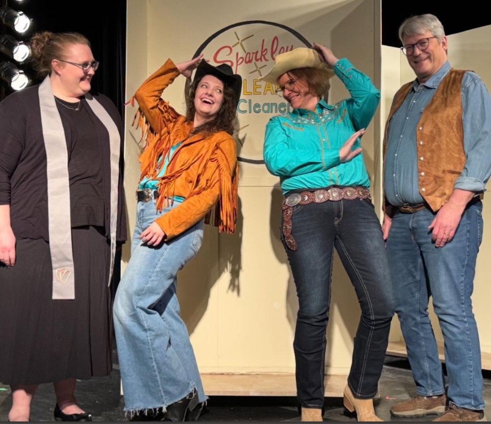 The Sparkley Clean cast in Western-inspired costumes on stage