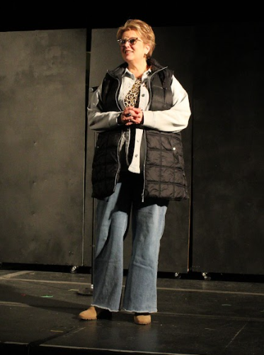 Woman standing on the Zumbrota State Theatre stage